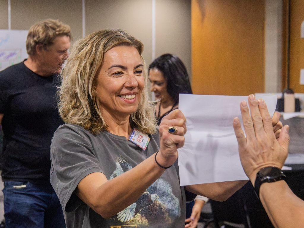 A participant smiling during a partner exercise